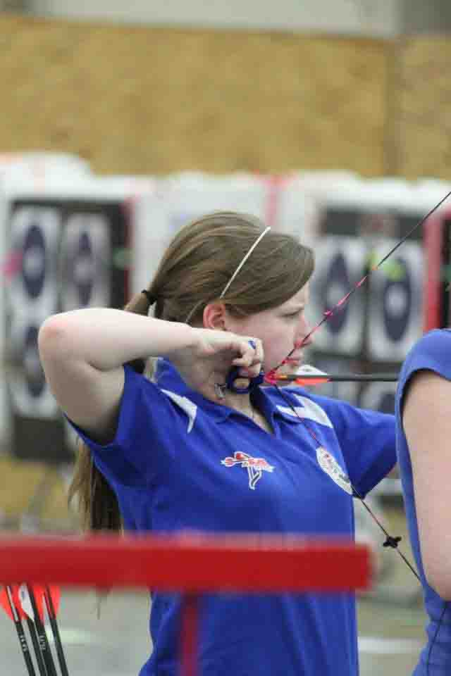 Pulling back on her bow, senior Hunter Hauk aims for the target. Hauk has been practicing archery since 2009 and is hoping to attend the 2016 Summer Olympics.  
