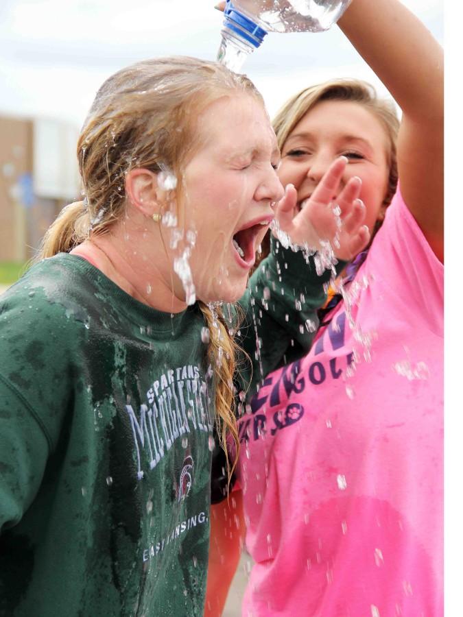 Senior Year. On the seniors last day, senior Tailer Przybolowbicz dumps cold water on senior Mackenzie Murphy. “We were almost done with the water fight and some of the seniors started to go against seniors,” Murphy said. “Tailer Przybolowbicz came up behind me and dumped freezing water on my head. Out of all four years I think our water fight was the best and it was my favorite senior prank and one of my best memories.”