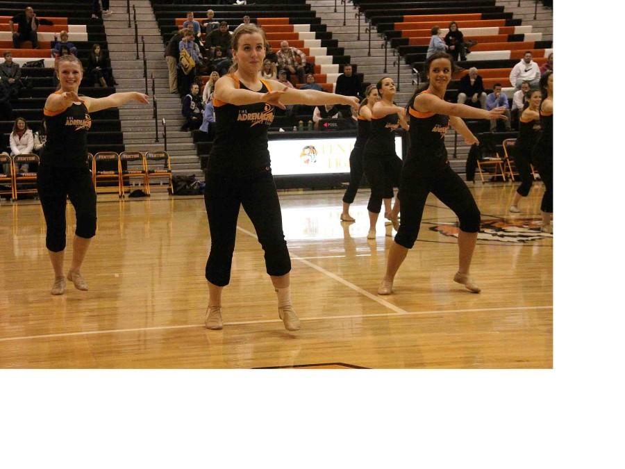 Sophomore Year. On Fenton High’s first dance team, senior Abby Bills performs at halftime. “I knew the coach, Brynn, so a couple of us asked her to be our coach because we wanted to make a team,” Bills said. “It was really cool to see that actually happen and to be a part of it.”