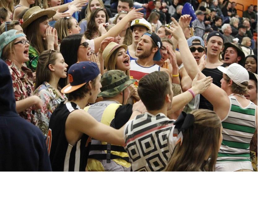 Senior Year. On Beach Day, senior Landon Mikulenas cheers in the student section. “It was cool being the senior and starting cheers and participating in themes,” Mikulenas said. “The themes were new this year and it seemed like lots of other schools started doing it too.”