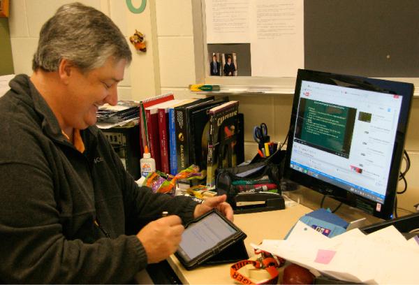 Math teacher Steven Karr uses the Teach Everything app to create his online videos of notes for his Pre-calculus and AP Calculus students. Karr has used this app from the beginning of the school year so his students could watch lecture videos for homework and complete book problems during class time.