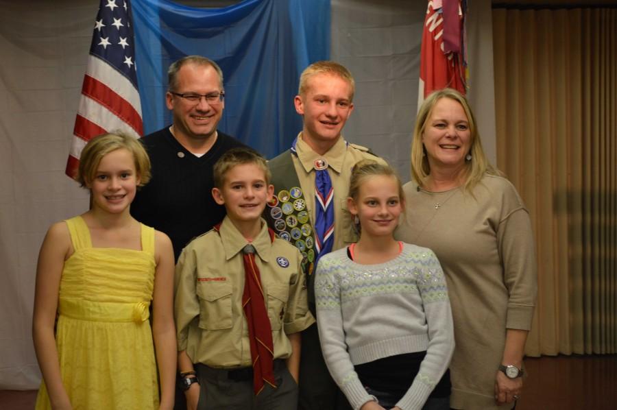 The Maier family poses for pictures after the ceremony. My family has been a huge help, freshman Noah Maier said. A lot of my peers from scouting and friends from school were also always there to support me and work with me. It was a big help from a lot of people, and I appreciated it.
