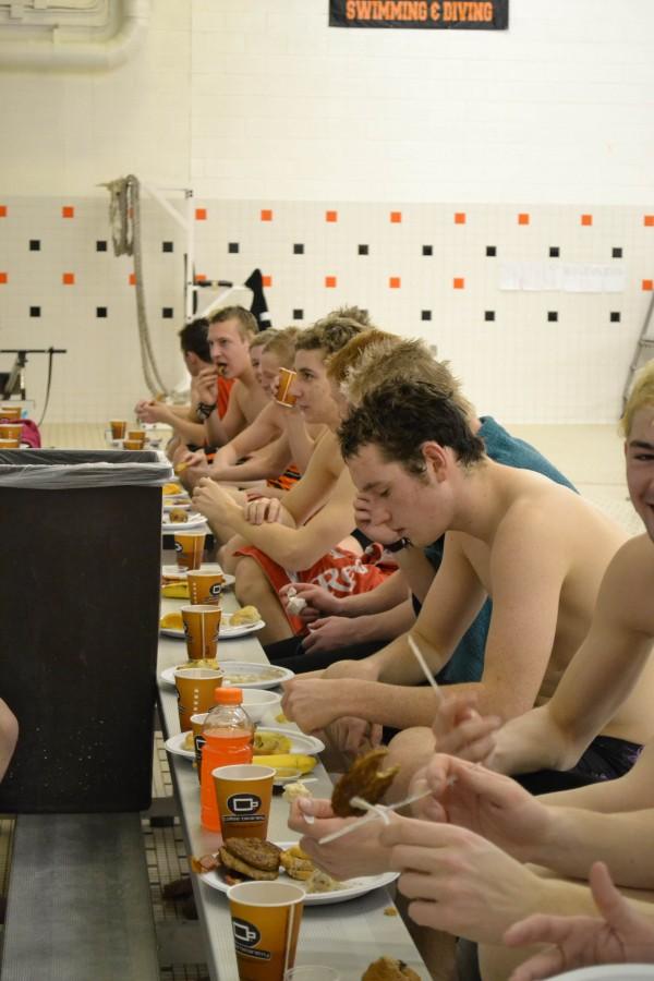 To conclude their Hell Week practices, the boys swim team held a celebratory breakfast last Friday. Hell Week has prepared the team for the Metro League Finals where they will go against five other Metro League teams for a two day competition for the Metro League title. This year the competition is at Brandon on Feb. 26 and 27.