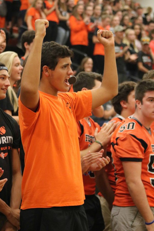 During the Homecoming pep assembly on October 7th, junior Matt Sullivan cheers for his class. 