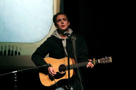 Performing at his last talent show, senior Brennen Henson sings and plays his guitar to Adele’s “When we were young”. The night consisted of many talented students singing, dancing, and playing instruments competing for 1st place. 