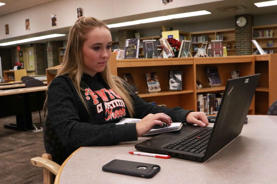 As an alternative to learning in a classroom, junior Kelly Canning takes a online class in the library in place of her third hour class during her A days. The school offers many online classes for students who wish to take them.