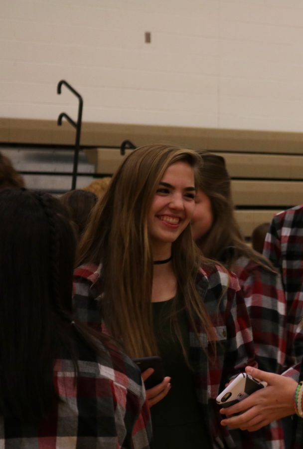 Junior Annie Koester shows a big smile on her face during Meet the Team on November 22th. Their first race is on January 5th and they are excited for the cold weather to come. 