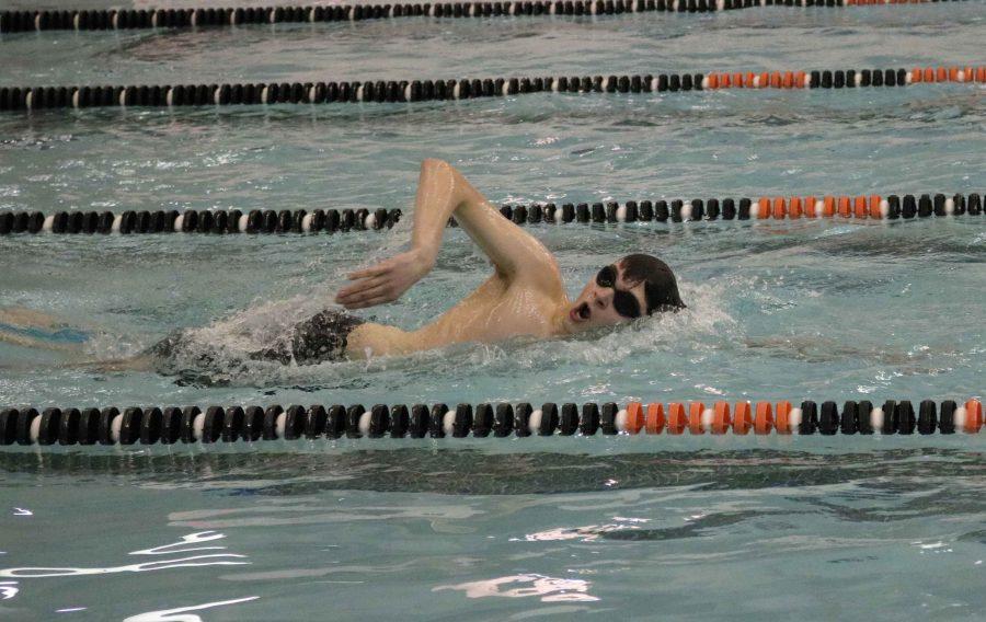 On Feb. 14, senior Alex Joitke swims the 200 Freestyle. Joitke swam his hardest against Kearsley. 