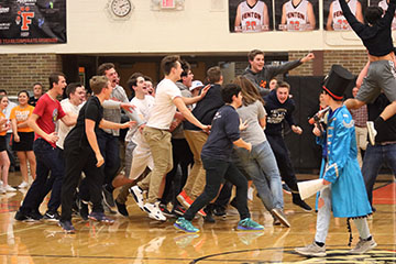 Sophomores get excited at the end of the Pep Assembly for winning the games for their first year. After they won the tug of war this was their reaction of hearing they were in first place. 
