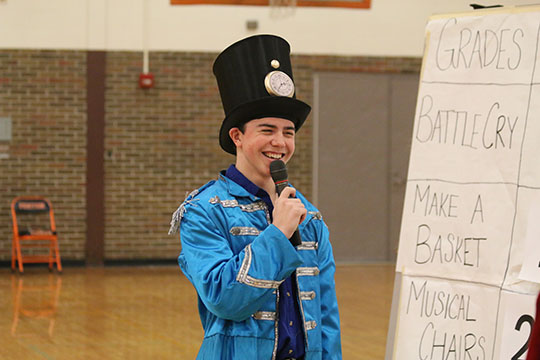 Senior Chase Raymond emcees the winter pep assembly. The sophomores took home the spirit stick. 