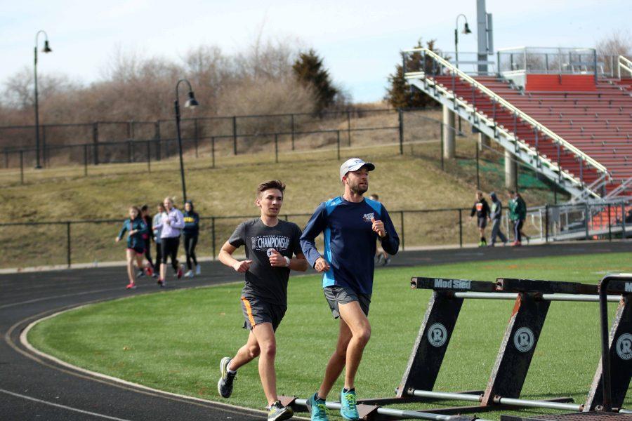 During one of the first track practices of the season, senior Dominic Dimambro participates in the lap-a-thon to raise money for a fundraiser. 