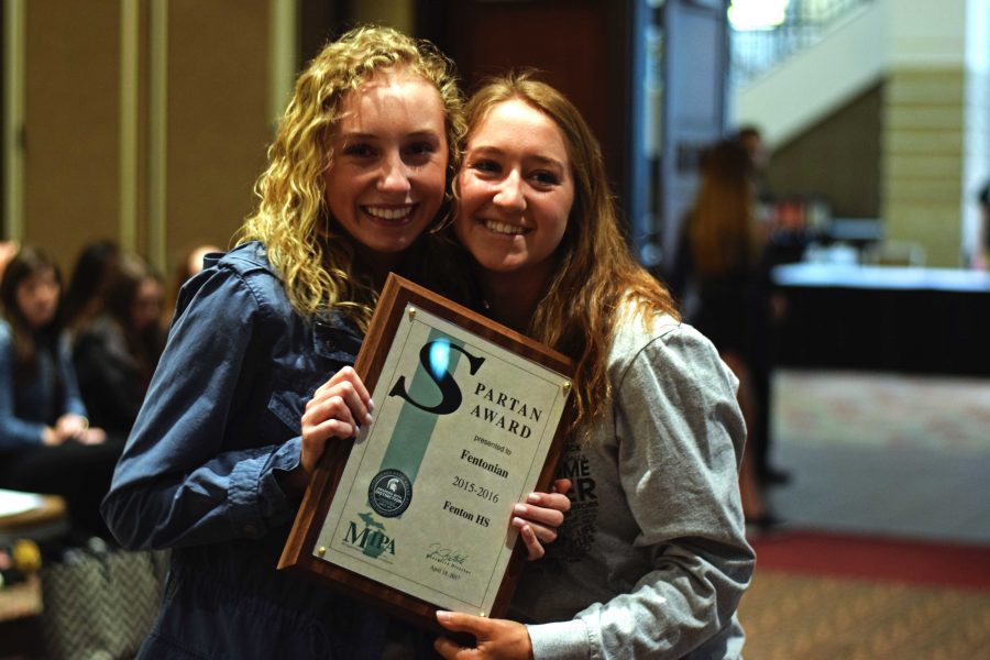 Both of the Yearbook Editor-in-Chiefs, Michaela Youngs and Brenna Bleicher, accept a Spartan Award for the 2015-2016 Fentonian.