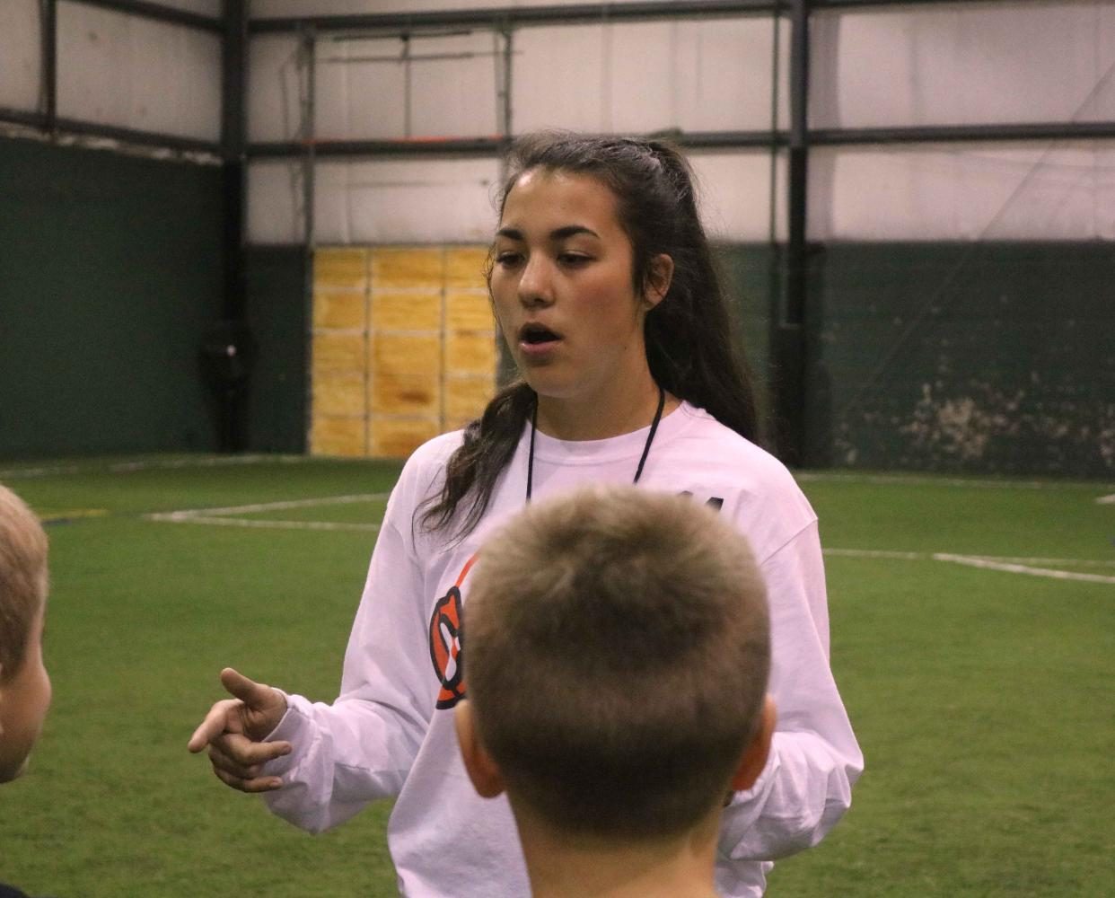At the soccer Lock-In junior Kara Kinser, gives the kids instructions on how to safely play soccer. The Soccer Lock-In was a fundraiser to help support the girls’ soccer program. 
