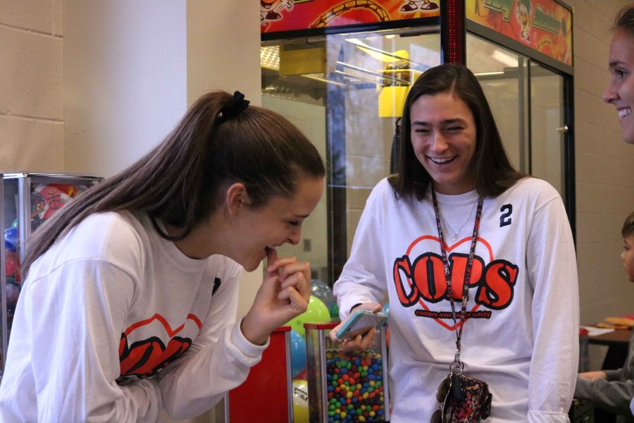 While at the Fenton girls Soccer Lock-in, sophomore Erin Conroy laughs at a joke junior Margaret Berry had just told.  The fundraiser was held at Sports Lab on Torrey Road on Apr. 21 to help raise money for the girls soccer program.