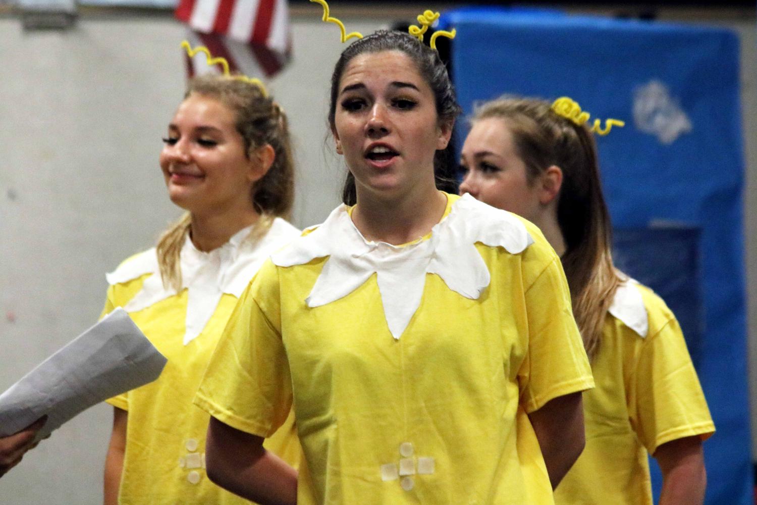 Playing her role as one of the Sneetches in a rendition of the Dr. Seuss book, sophomore Andreah Keoshian faces the audience. Her and her group were  tasked with picking a childrens book to act out in front of all of the theatre students for Drama Day on May 26. 