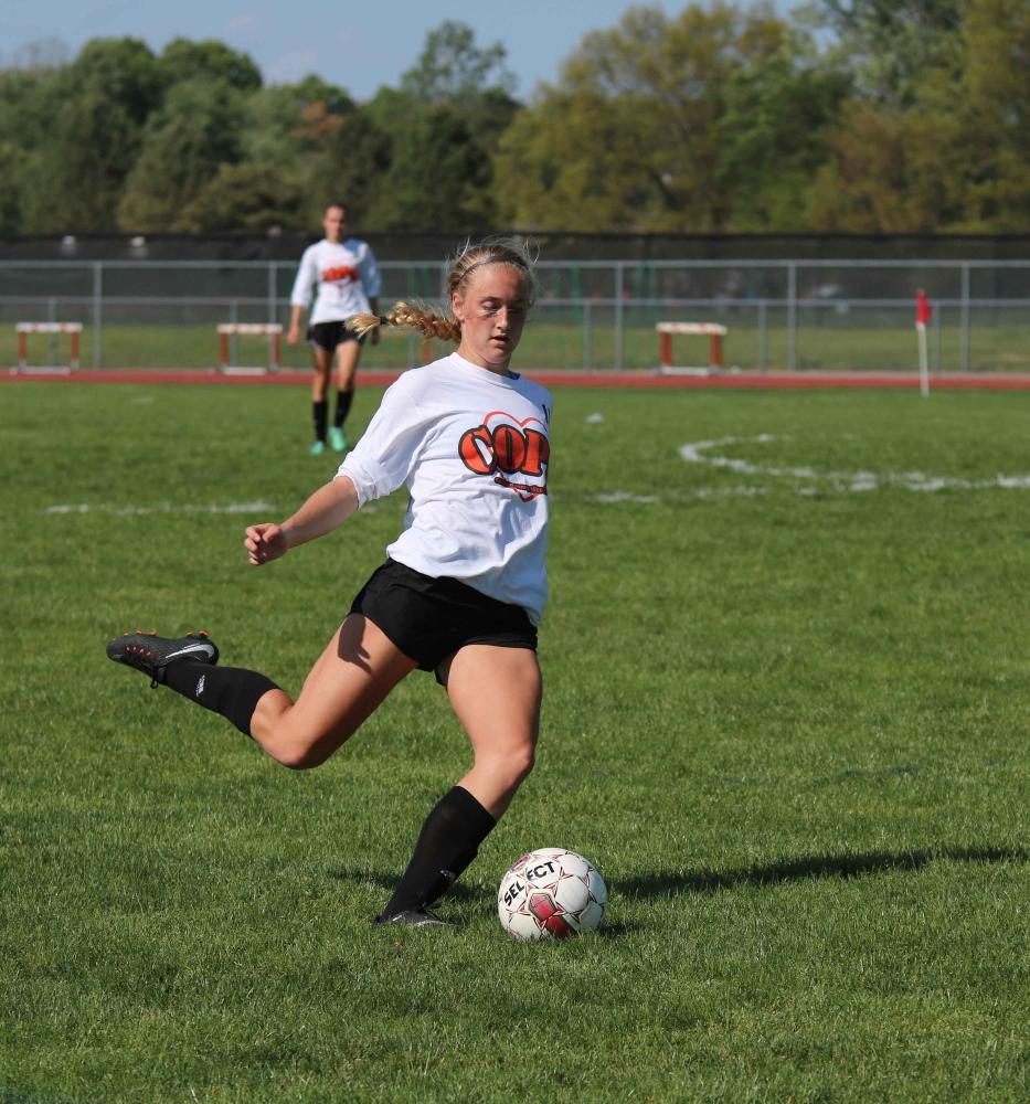 Freshman Hannah Polzin, runs towards the goal to score in the Linden side of the field. While she was running, Polzin passed the ball to one of her teammate. 
