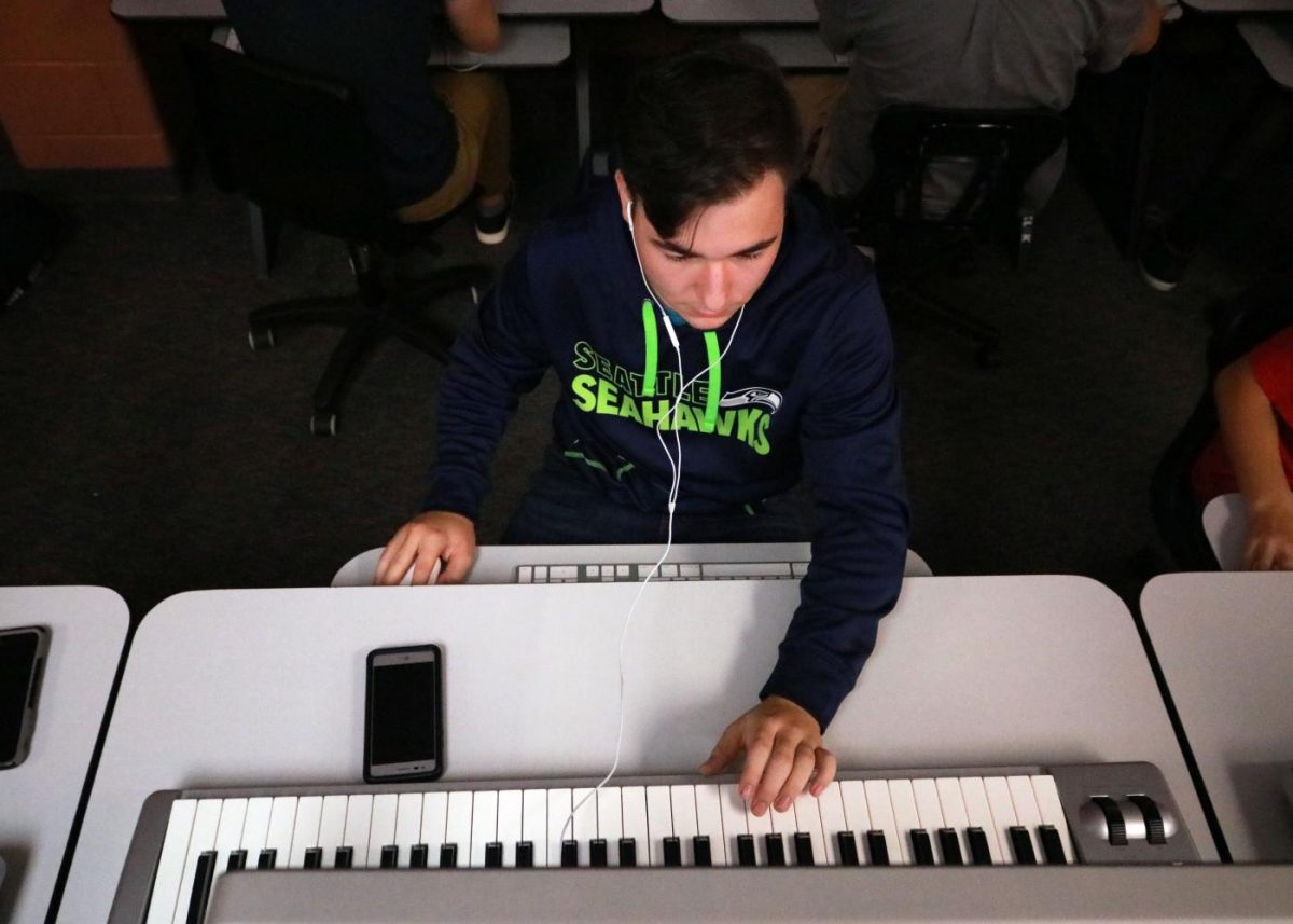 During his 1A Music Technology class, junior Jacob Kinser creates a tracks using the midi controllers. During Music Technology students use both Garage Band and Logic to create music. 