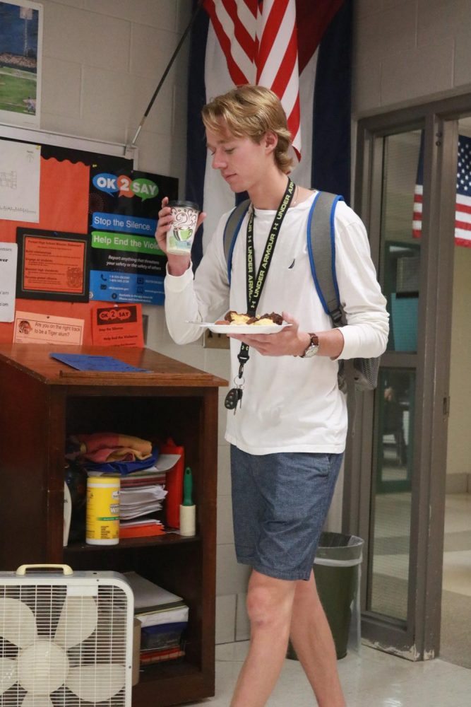 As senior Nolan Lawrence walks into his SRT with breakfast in hand, he is ready to start the new school year. 