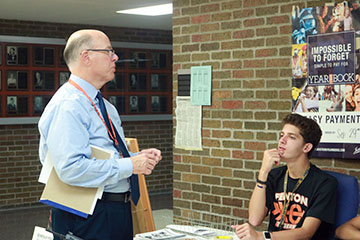 Senior Rudy Ebert talking to Mr. Suchowski about the Fentonian staff of 2017-18. After they talk about the staff, they talk about the yearbook.  