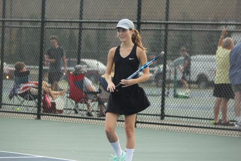 Senior Delaney Hundzinski plays against Goodrich in her four singles match. 