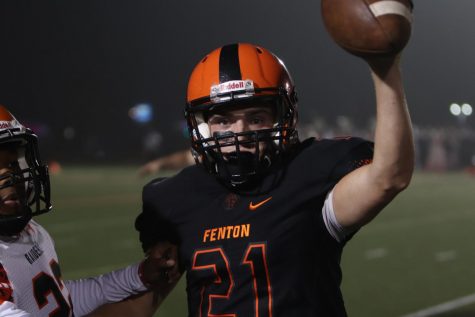 Fenton tigers win homecoming game against the Flushing raiders