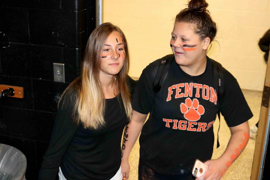  Showing their school spirit sophomore, Trinity Sawyer and classmate Kamarin Kovacs were wearing their orange and black. Over the past week students throughout Fentonschools showed their school spirit by participating in spirit week for homecoming.
