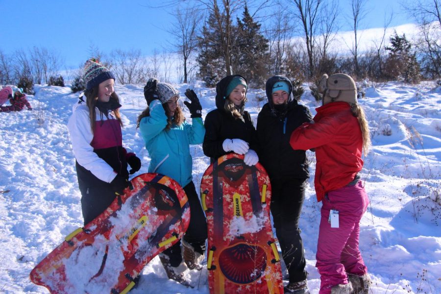 To commemorate the snow day, sophomores Julia Adams, Maria Ebert, Briel Sanford, Audrey Weir and Julia Young spent the day sledding with friends. 