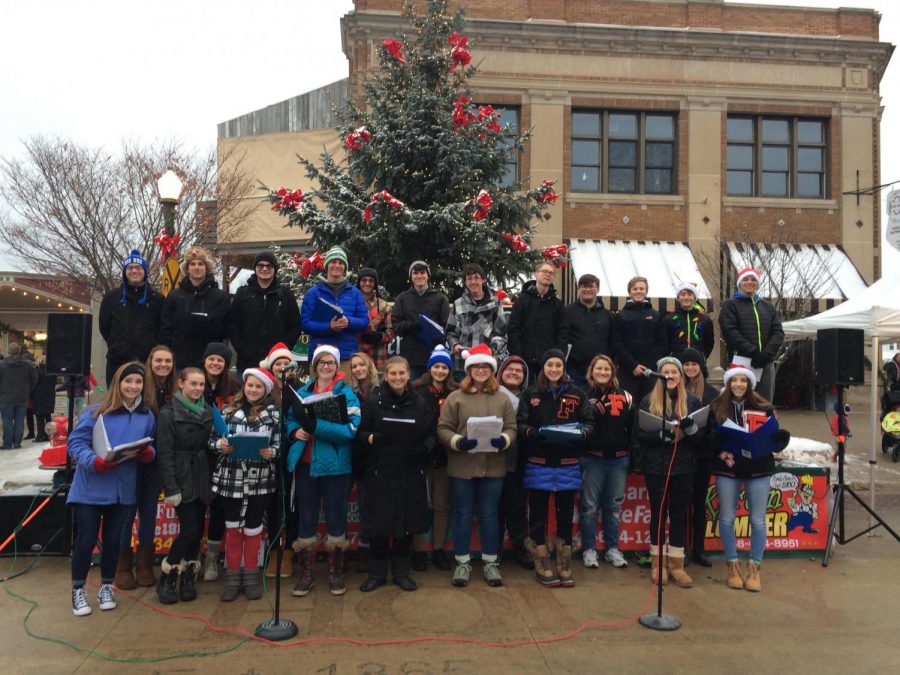 Varsity Vocals performs during the last weekend of the Holly Dickens Festival