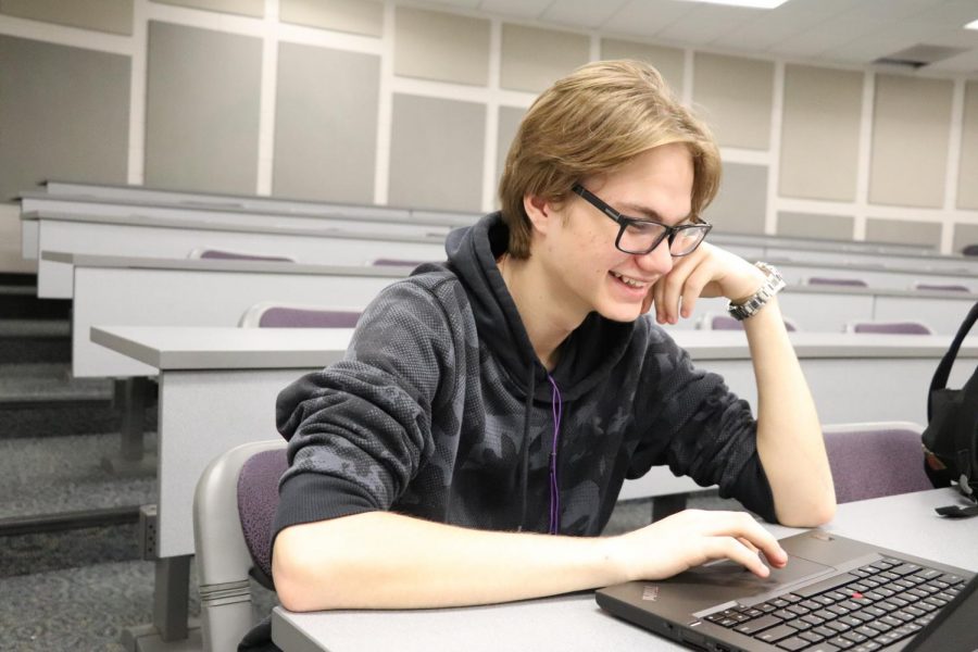Junior Rocco Idoni schedules his classes for next school year with his counselor. Fenton Area Public School decided to cut block scheduling due to a budget issue. 