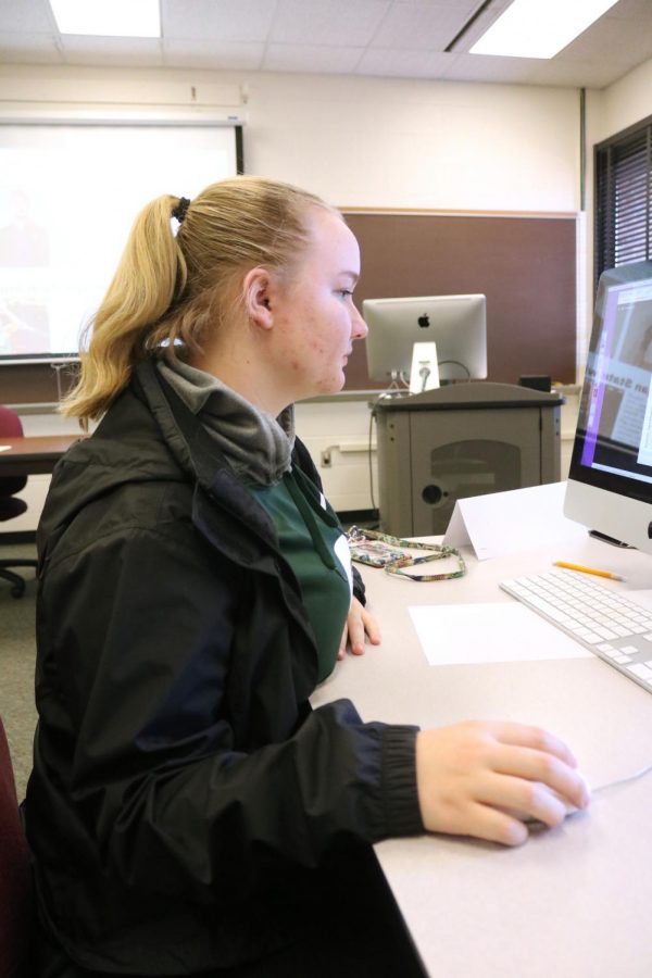 Freshman Catherine Haynes learns InDesign as preparation to be business manager. Newspaper and yearbook students went to a one day MIPA workshop to learn about InDesign and photoshop. 