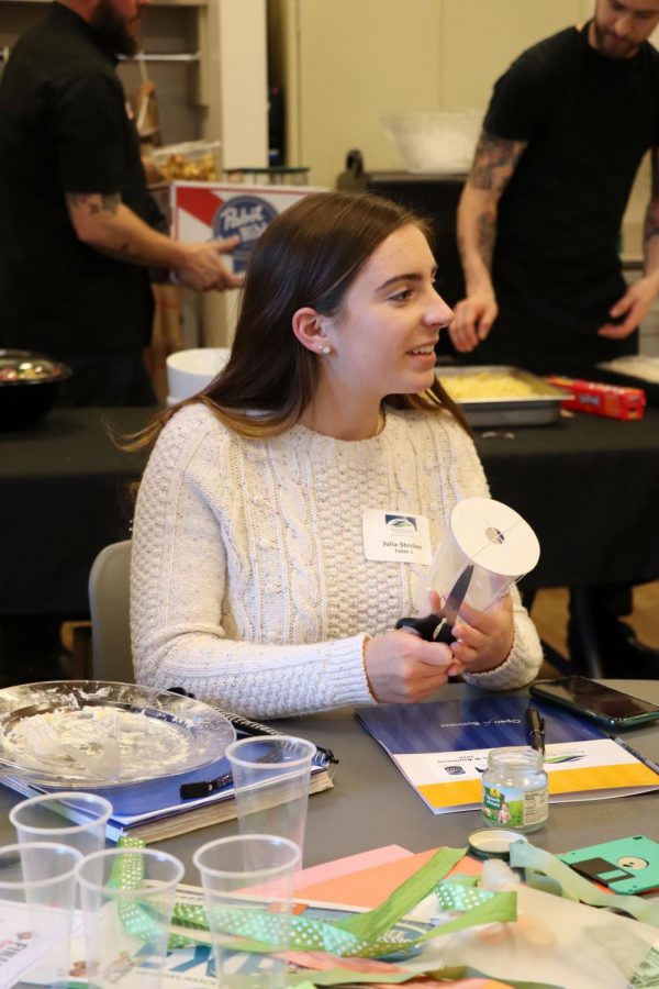 While attending girls in business, junior Julia Stocker works with her group to come up with an invention and a marketing plan to go with it. The girls who were present had the chance to talk to multiple women who took the opportunity to pass on any advice they had.