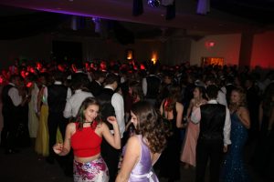 After finishing dinner, students gathered onto the dance floor.