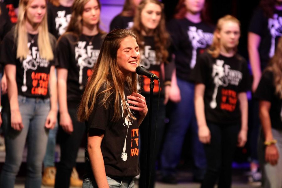 Bella+Voce+junior+Lauren+Koscielniak+sings+the+beginning+of+You+Are+the+Music+in+Me+from+High+School+Musical+as+her+solo.+All+the+choirs+sang+on+May+22+for+their+performance%2C+Battle+of+the+Choirs.