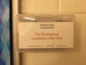 Next to every door in the school, a box attached to the wall contains the red Nightlock piece.  