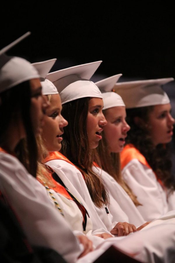 During the Baccalaureate cermony senior, Libby Carpenter sings along with classmates. Seniors were welcomed to attend the Baccalarureate Ceromony and reflect of their years at Fenton High.