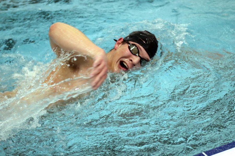 Senior Zach Jump, swims laps during practice to prepare for the next meet. On Jan 14. the swim team held practice, which they do every day after school.