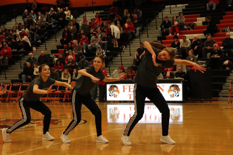 When the varsity basketball teams take half time. Freshman Elise Roberts and her fellow Adrenaline teammates took the floor on Jan. 4.
