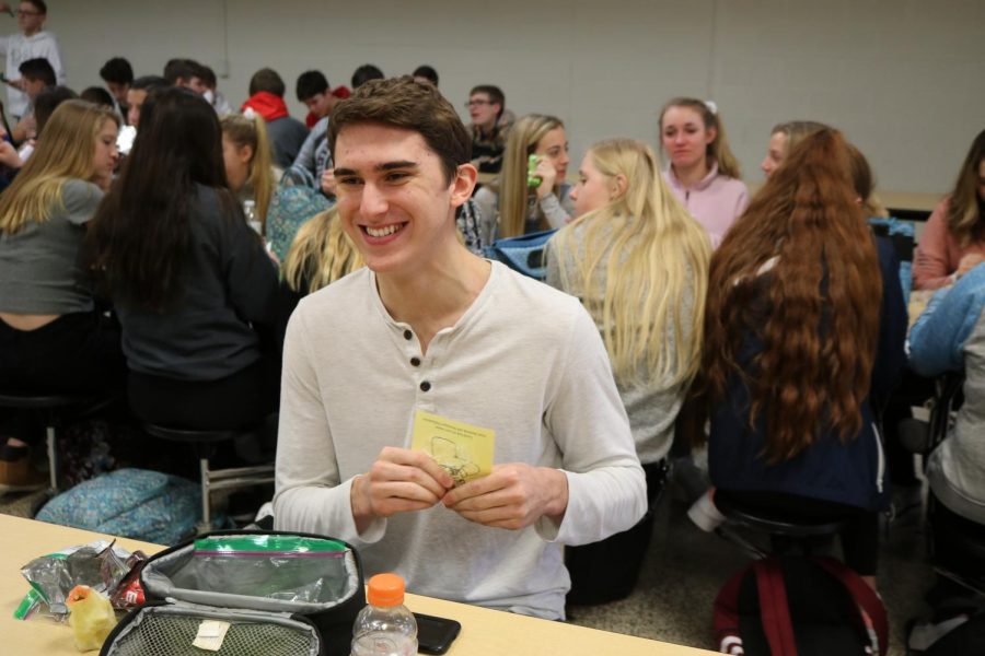 Junior Brendan Rosa pops bubblewrap to relieve stress. FHS Publications gave students pieces of bubblewrap on Jan. 16 to help them relax during exam week. 
