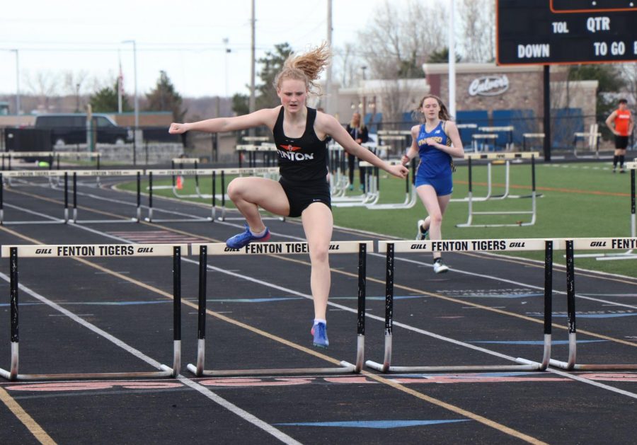 Hopping over the hurdles, junior Stasia Campbell finishes in 2nd place. Campbell competed in the 100 yard hurdles against Linden and Owosso High. 