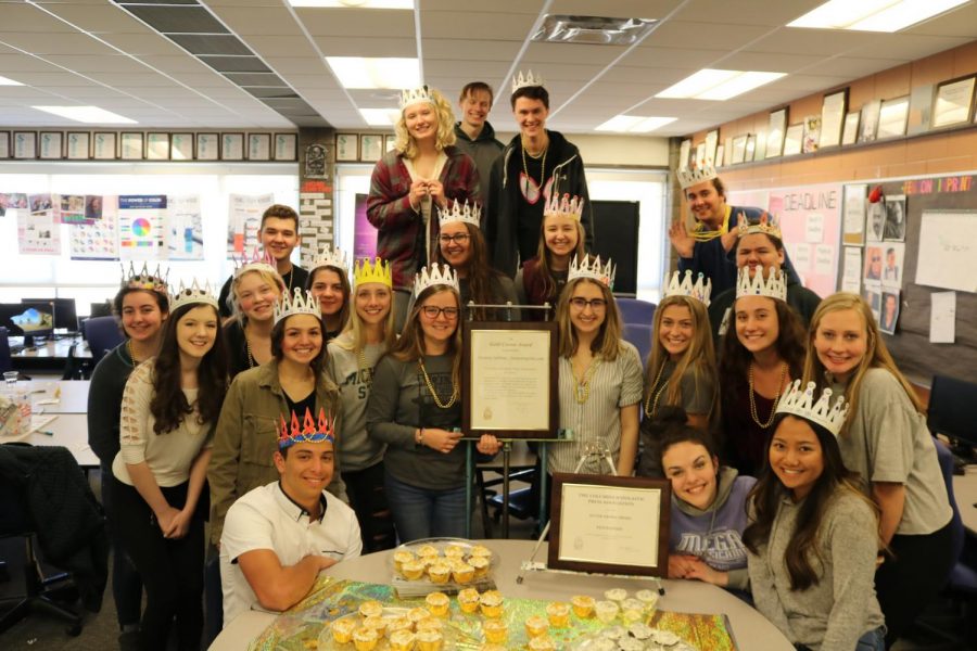 Members of the Fenton InPrint staff pose with the Gold Crown award. 