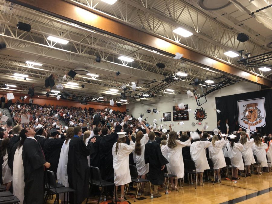 The class of 2019 throws their caps into the air. Seniors were celebrated at the graduation ceremony on June 2. 