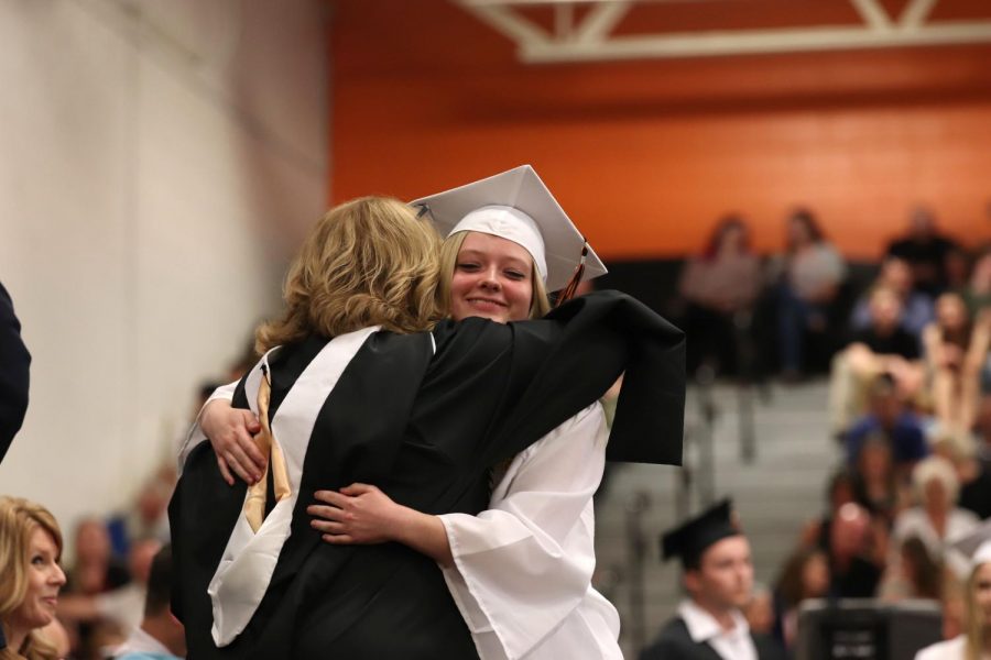 Before getting her diploma Fentonallumni Emma Senyko hugs her mother. On June 2 the class of 2019 graduated from Fenton High.