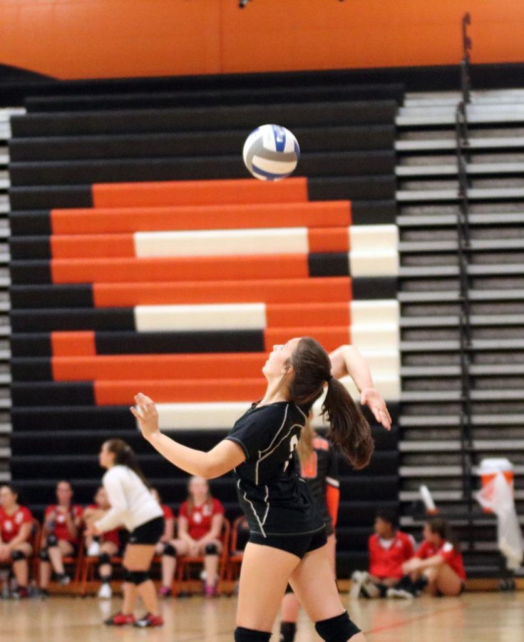 Freshman Kylia wheeler serves the ball to the opposing team. On Sept. 5, the JV Volleyball team played Swartz Creek at home winning their last 2 games.
