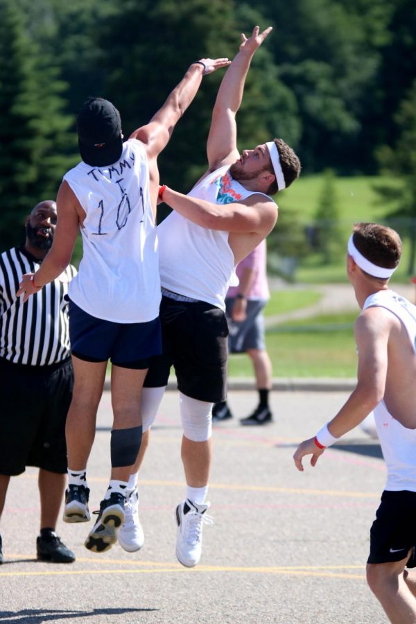 While participating in the 2019 Gus Macker Tournament senior Kaleb Anderson takes a shot for the basket. This year the tournament was held at Linden Middle school.