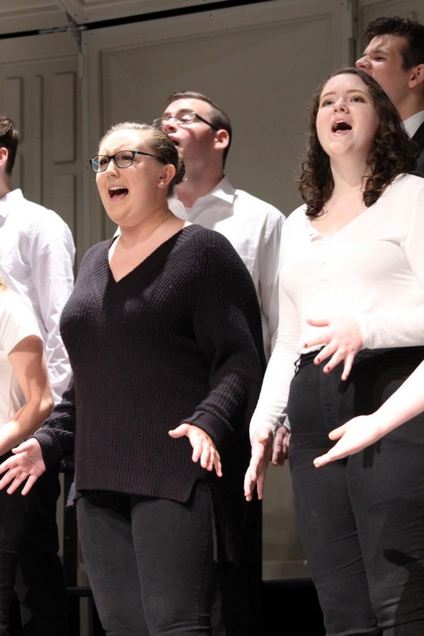 Junior Drew Baldwin and senior Alyssa Keoshian sing Guiding Light by Mumford & Sons at the Fall Informace. The Fenton High School choirs held the Fall Informance on Oct. 24 in the auditorium.