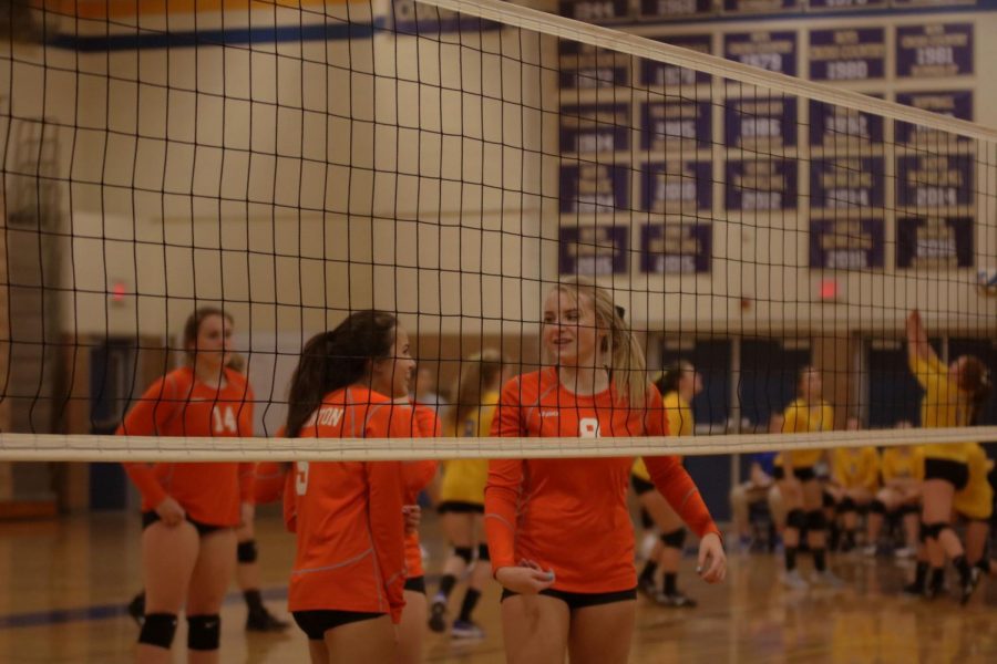 Sophomore Lizzy  Wakeham stands at the net waiting for the serve. On Oct.16, the JV Volleyball team played Flint Kearsley and won all 3 games.