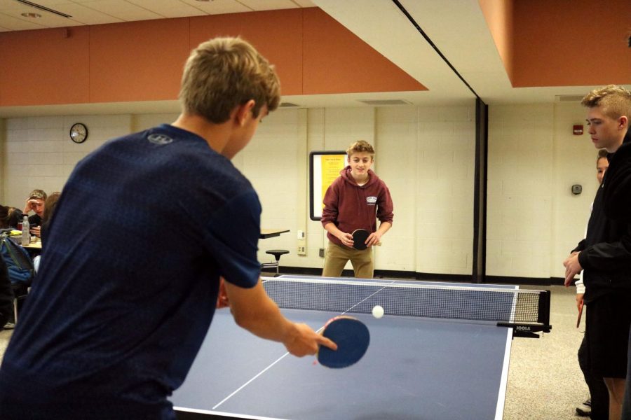 During lunch, freshman Ben Grob was playing a game of ping pong. Since Nov. 6, students can now play ping pong at every lunch. 