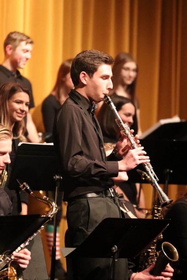 At the FHS band concert, junior Brody Stack does a solo on his clarinet. The  Symphony and Jazz Bands held their concert on Dec. 17.