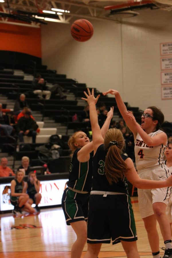 Shooting the basketball, sophomore Lauren Gangwer attempts to score. The JV team played Lapeer on Dec. 3.