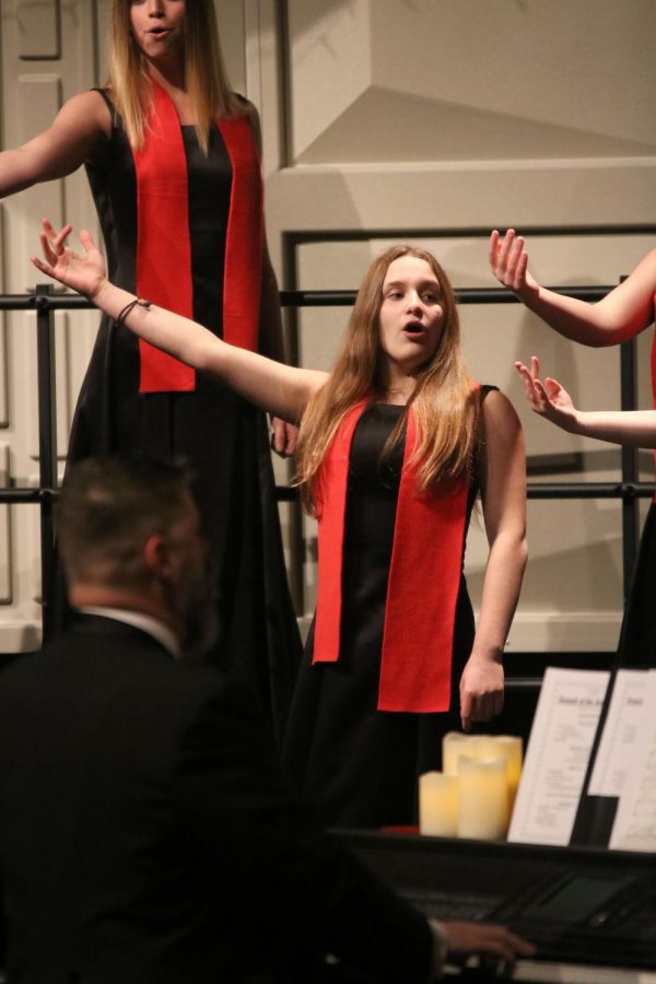 During+the+holiday+concert%2C+freshman+Alexis+Lemansky+dances+to+12+Days+of+Christmas.+Bella+Voce%2C+Varsity+Vocals+and+the+Ambassadors+held+their+annual+concert+on+Dec.+11+at+Fenton+High+in+the+Ruby+Zima+auditorium.
